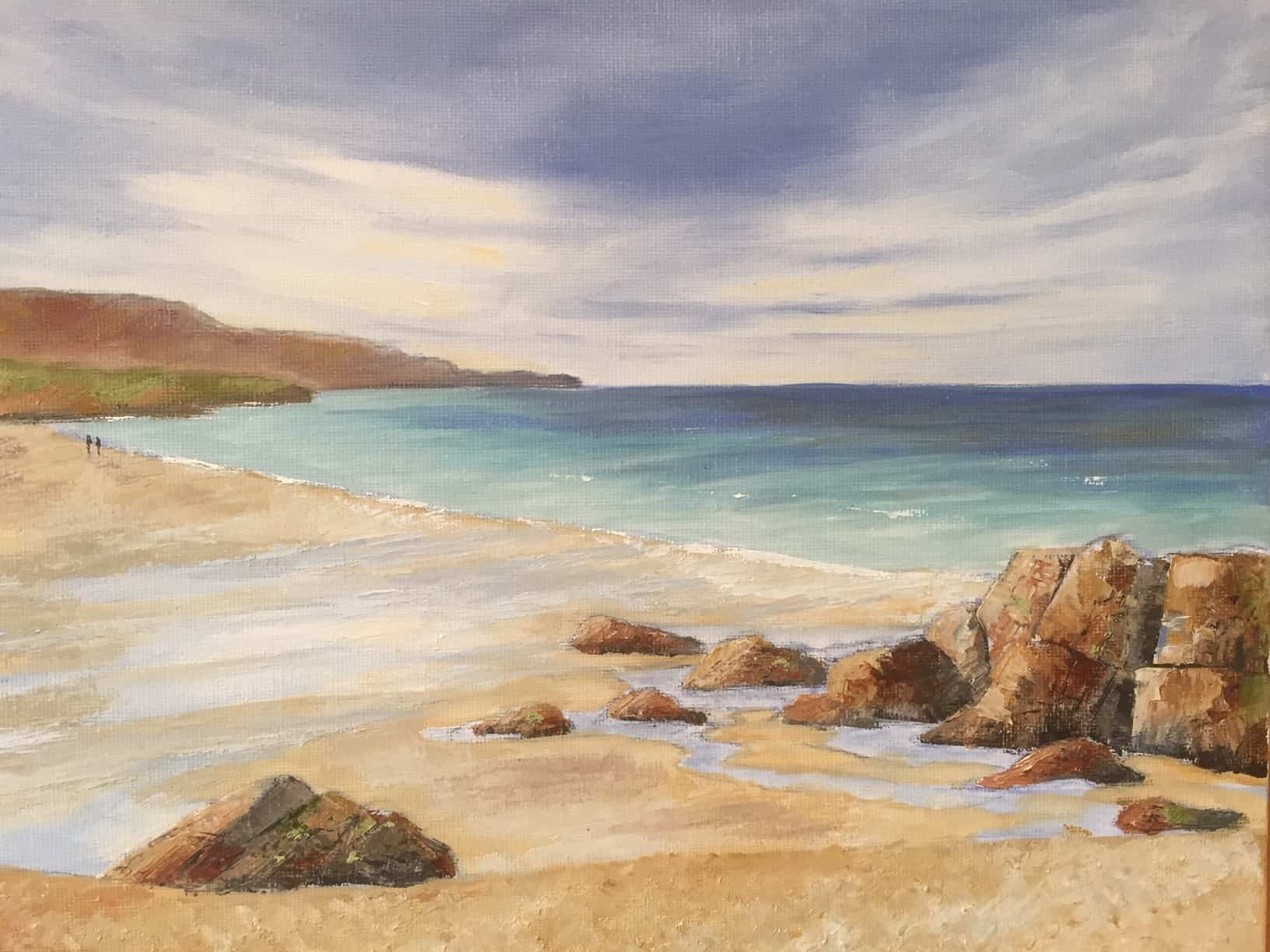 Rocky beach in oil